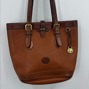 Dooney & Bourke bucket bag made from their signature All-Weather Leather (AWL